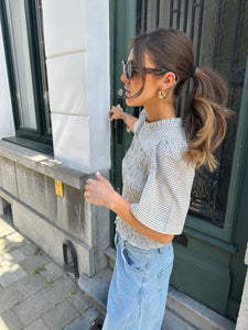 Possini check top